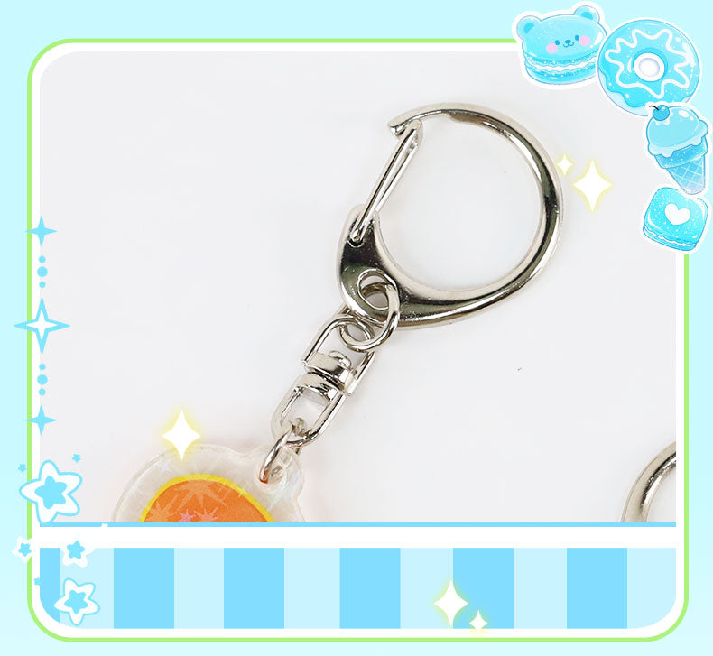 Acrylic keychain metal attachment close-up with durable clasp and ring
