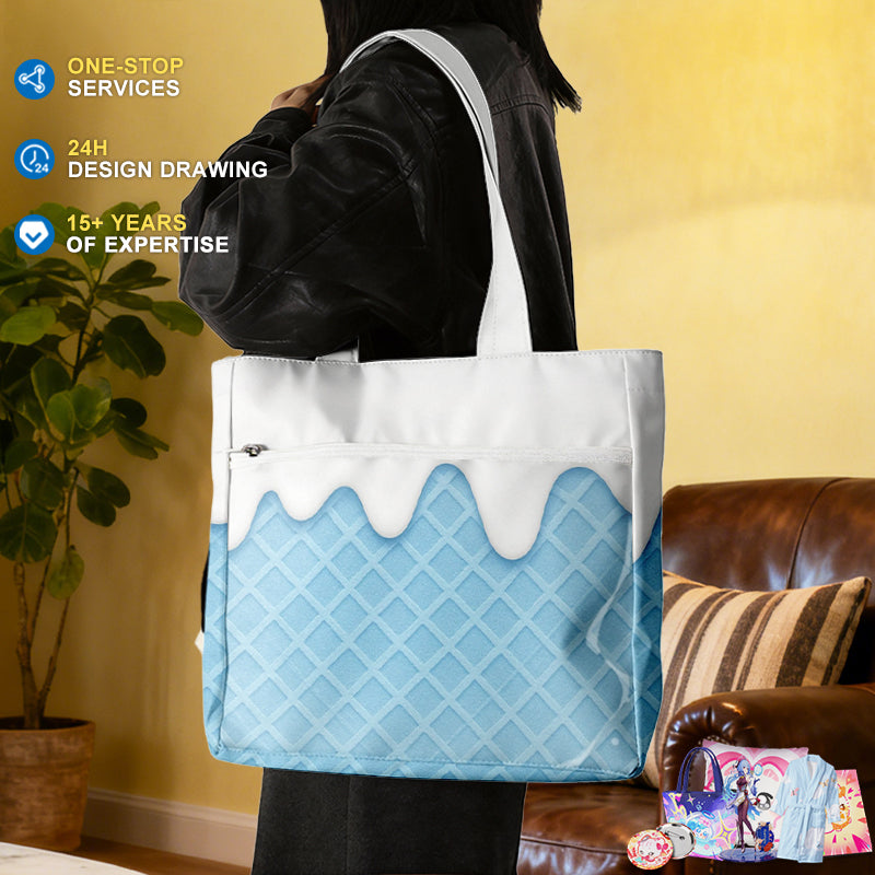 A model on the shoulder displaying the custom blue slime dripping pattern composite fabric tote bag.