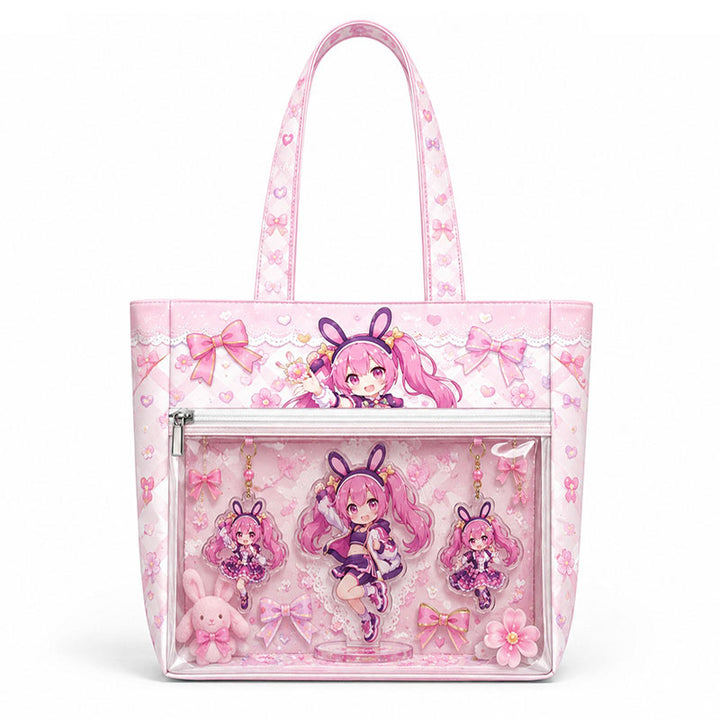 A light pink custom ita bag decorated with ribbons and a clear pocket showcasing anime plush charms.